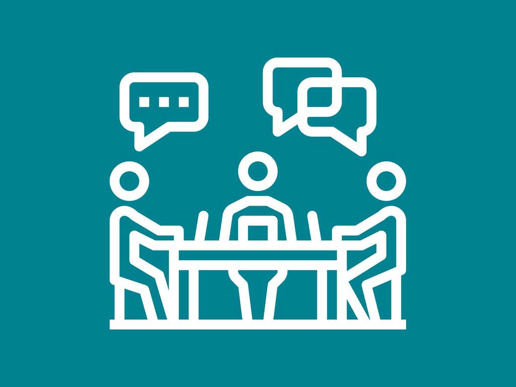 Icon of board members sitting around a table on a teal background.